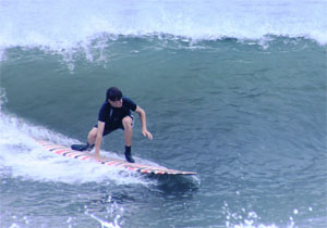 surfing at medewi beach bali